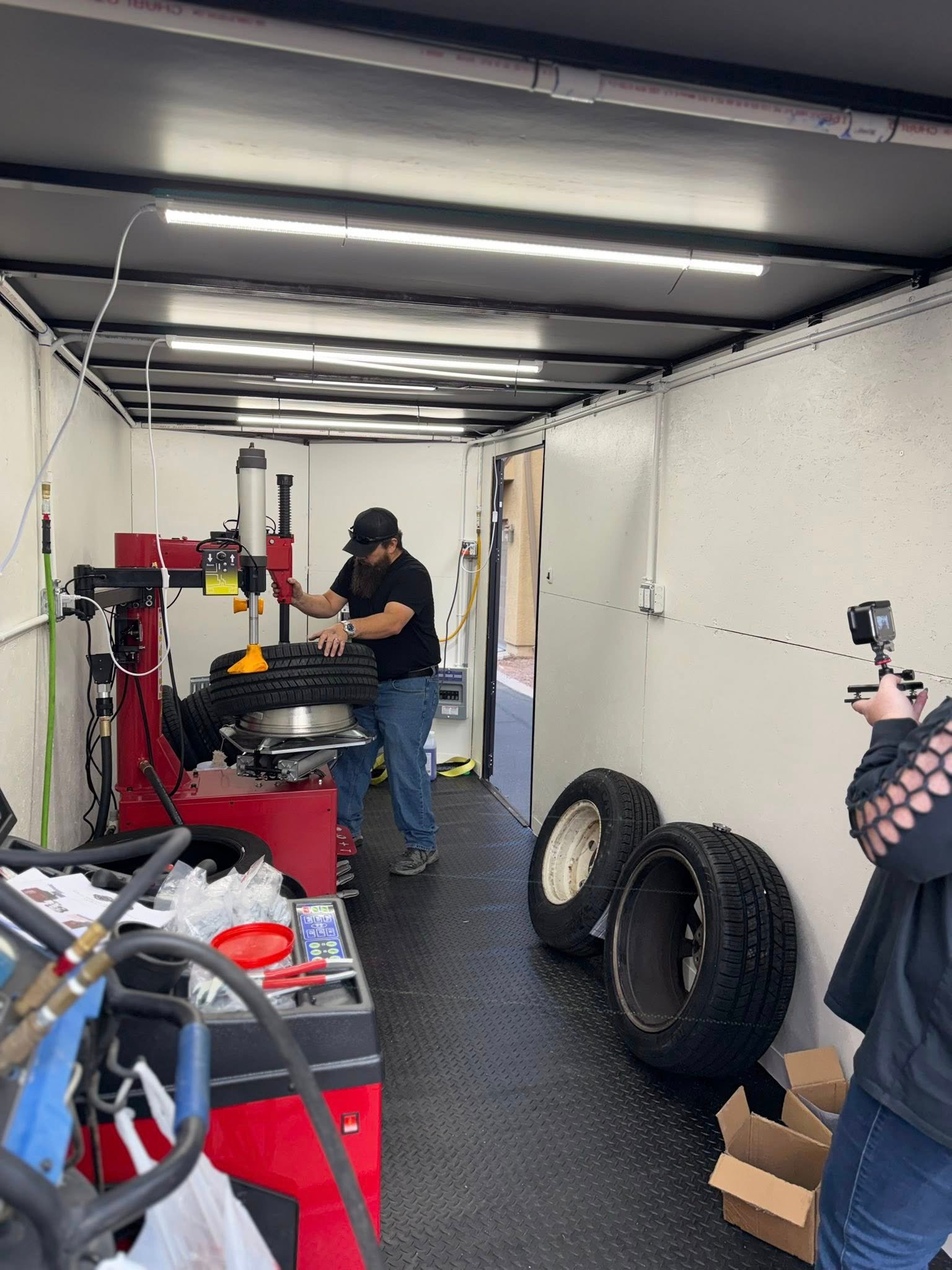 Mobile tire service in progress by Precision Mobile Tire team